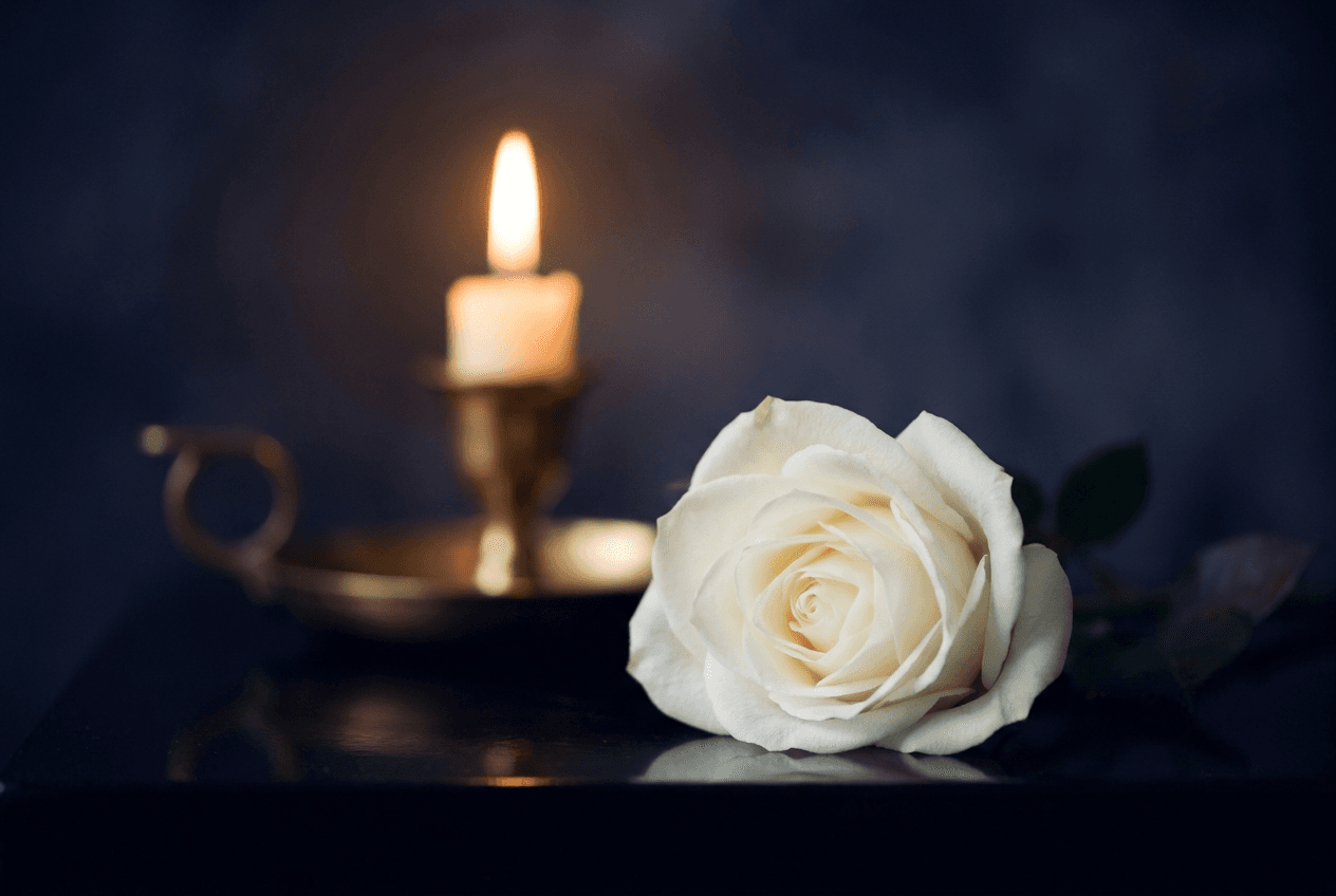 Trandafir alb și lumânare — servicii funerare cu respect, București